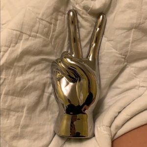 Silver peace hand statue